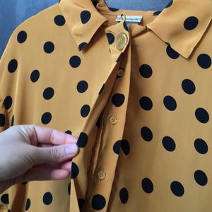 Dark mustard yellow and black polka dot blouse